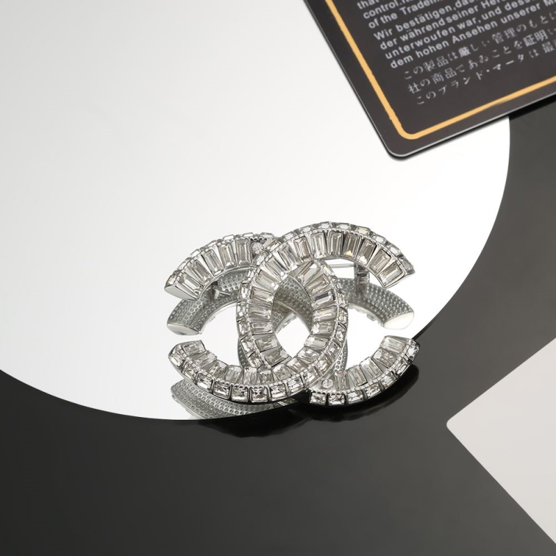 Ch**el brooches